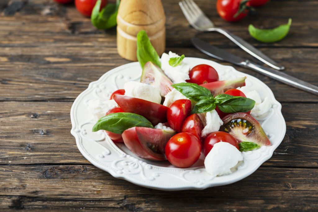 Italia salad caprese with tomato, basil and mozzarella